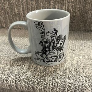 Jerry Leigh Disney Sketch coffee mug features an illustrated design